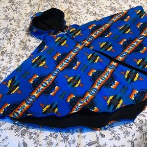 Waterproof hooded poncho/cape